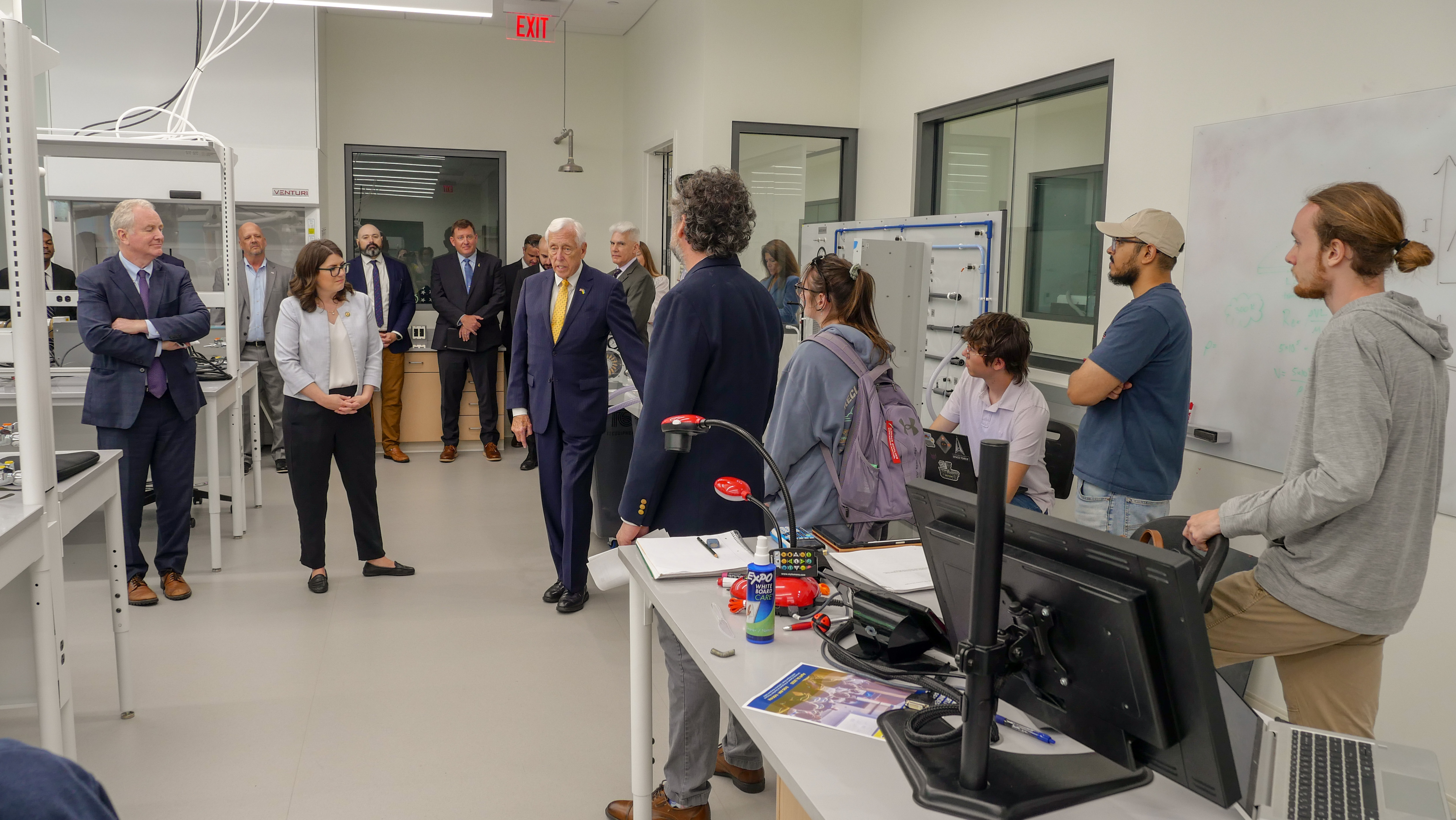 Congressional leaders inside the MATRIX Lab surrounded by researchers and students