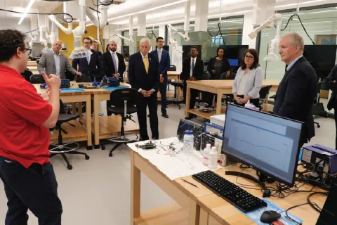 MATRIX Lab Director of Remote Sensing and Microsystems Justin Stine (left) explains the work on ingestible capsules going on in the building’s new Advanced Manufacturing Lab.