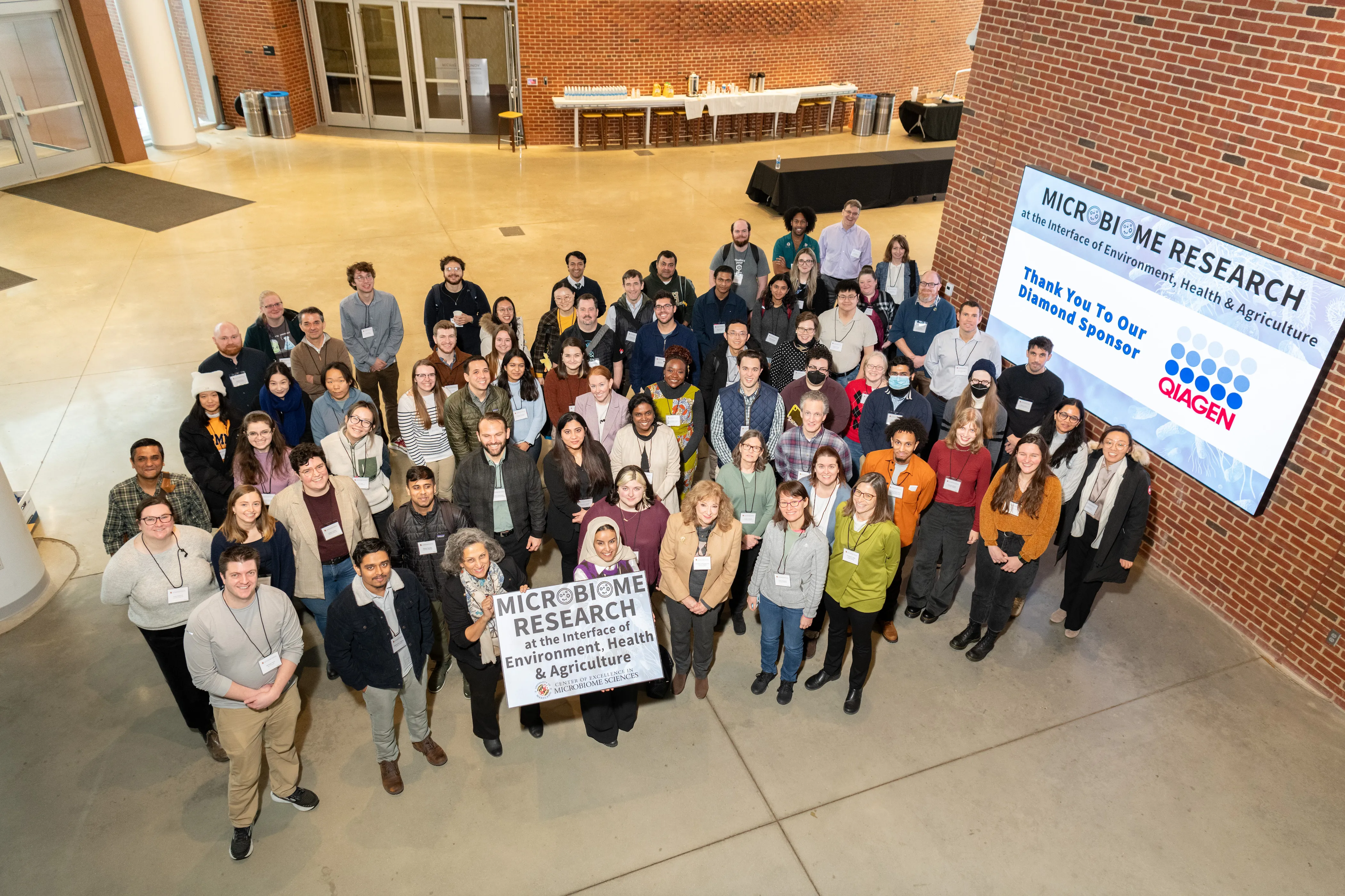 Group Photo of people at the conference, taken from a higher floor
